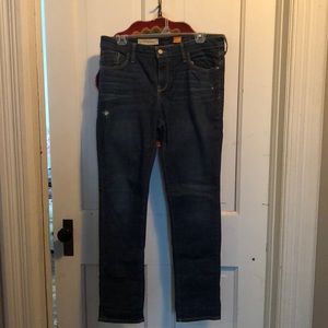 Dark denim distressed jeans